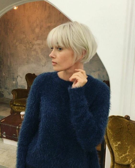 a pretty textural platinum blonde ear length bob with a classic outgrown fringe is a lovely idea