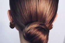 a refined sleek low bun plus a sleek top but wiht a volume is always a good idea that matches many outfits