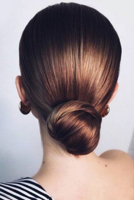 a refined sleek low bun plus a sleek top but wiht a volume is always a good idea that matches many outfits