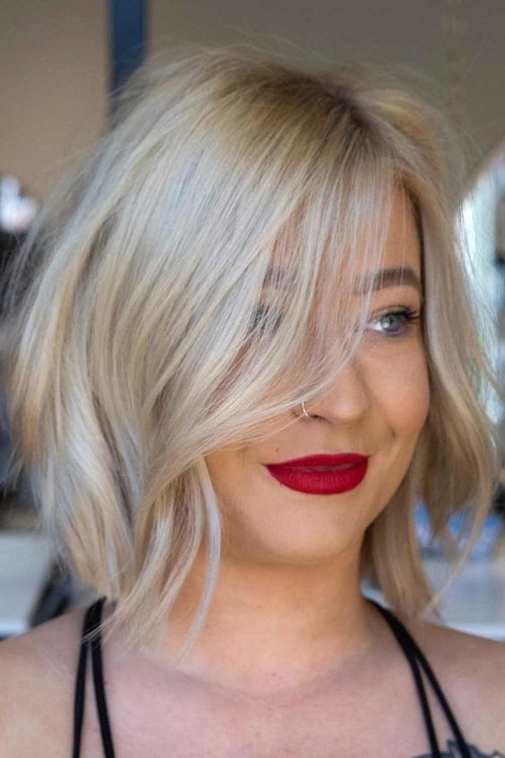 a sexy long blonde bob with waves and a messy texture is a cool idea, add red lip and you will wow