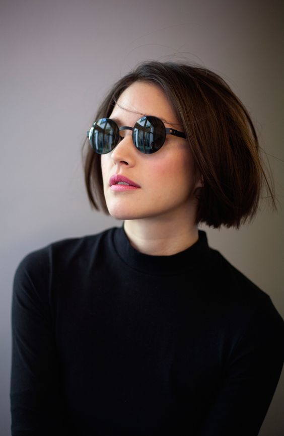 a short brown blunt bob with a lot of volume and a bit of texture is a cool solution that looks edgy
