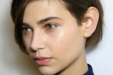 a simple and effortless brunette ea-length haircut with a messy part is a cool and low-maintenance idea