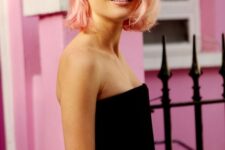 a soft pink midi length bob with side part and some texture and volume is a cool and fresh idea for spring or summer