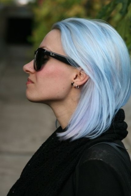 a straight pastel blue long bob with a bit of lilac locks is a stylish and catchy idea that looks modern