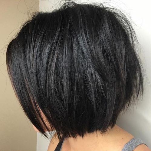 a voluminous midi black bob with a lot of layers to make it even catchier is a chic and catchy solution
