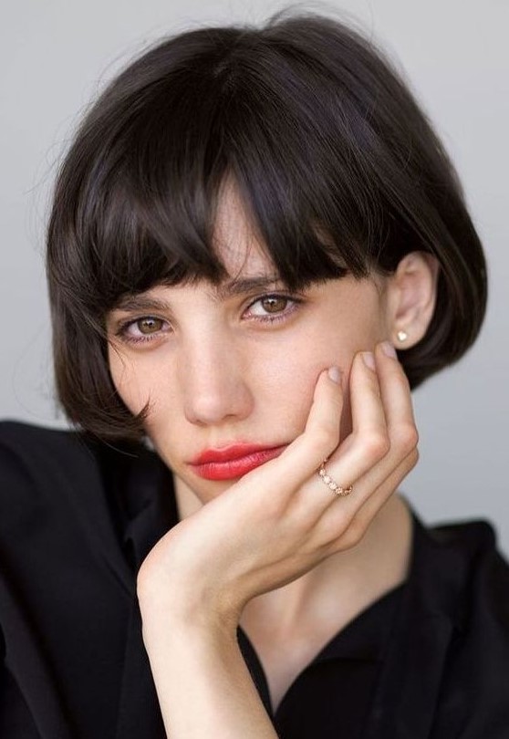an ear length bob with a classic fringe in black is a beautiful Parisian chic infused hairstyle