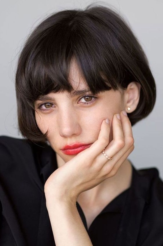 an ear length bob with a classic fringe in black is a beautiful Parisian chic infused hairstyle
