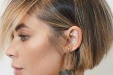 an ear-length bob with blonde balayage is a cool and catchy idea to rock, it looks modern and fresh