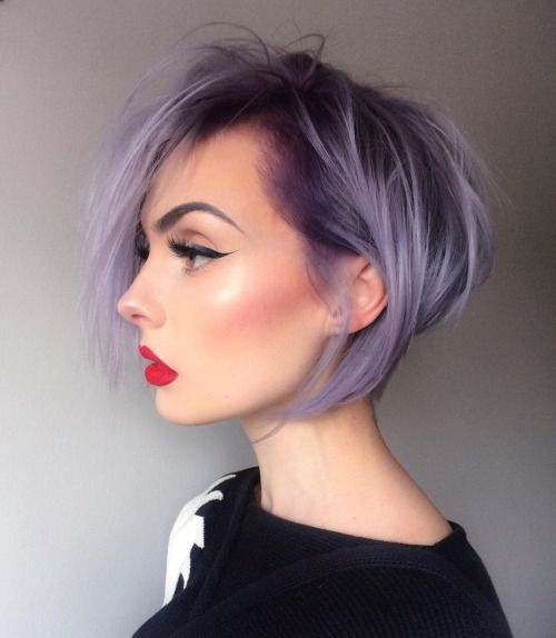 An eye catching lilac chin length bob with a darker root and a bit of volume is super cool