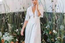 18 a plain modern midi dress with short sleeves and a deep neckline plus nude shoes are a great idea for a pre-wedding party