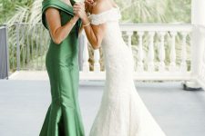 45 a green mermaid maxi dress with a V-neckline and some statement jewelry are a great combo for a mother of the bride