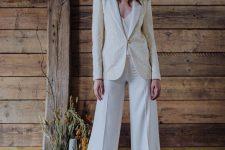 47 a corset top, wideleg pants, a neutral patterned blazer and a hat are a lovely look for a bride shower