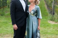 57 a relaxed and chic blue A-line maxi dress with a train, short sleeves and a V-neckline is a great idea for a mother of the groom look