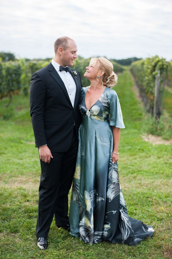 a relaxed and chic blue A-line maxi dress with a train, short sleeves and a V-neckline is a great idea for a mother of the groom look