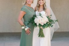 58 a stylish green maxi dress with a cutout and one shoulder neckline is a cool idea for a spring or summer mother of the bride look