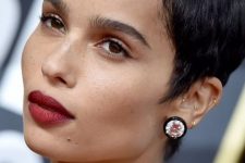 Zoe Kravitz wearing a short black pixie cut looks bold and cool and inspires to get such a cut, too