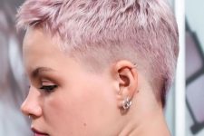 a beautiful pastel pink short pixie cut with an undercut is always an edgy idea, and its color makes it look softer
