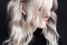 a beautiful platinum long hairstyle with waves looks delicate, chic and stylish and catches an eye with a lovely shade
