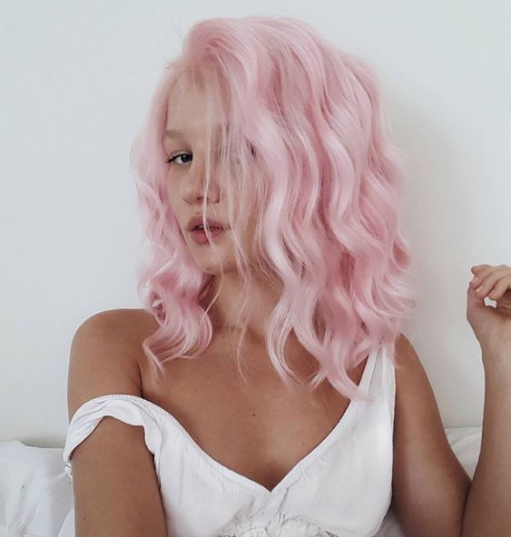 A beautiful shoulder length bubblegum pink wavy hairstyle with much volume is an amazing idea