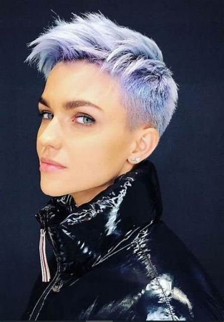 a blue and lilac layered pixie haircut with a lot of volume is a cool idea, it looks bold on thick hair
