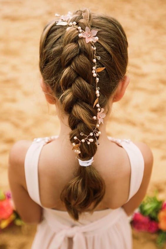 a braid with a hair vine is a simple and long-lasting solution for a flower girl, it looks cute and chic