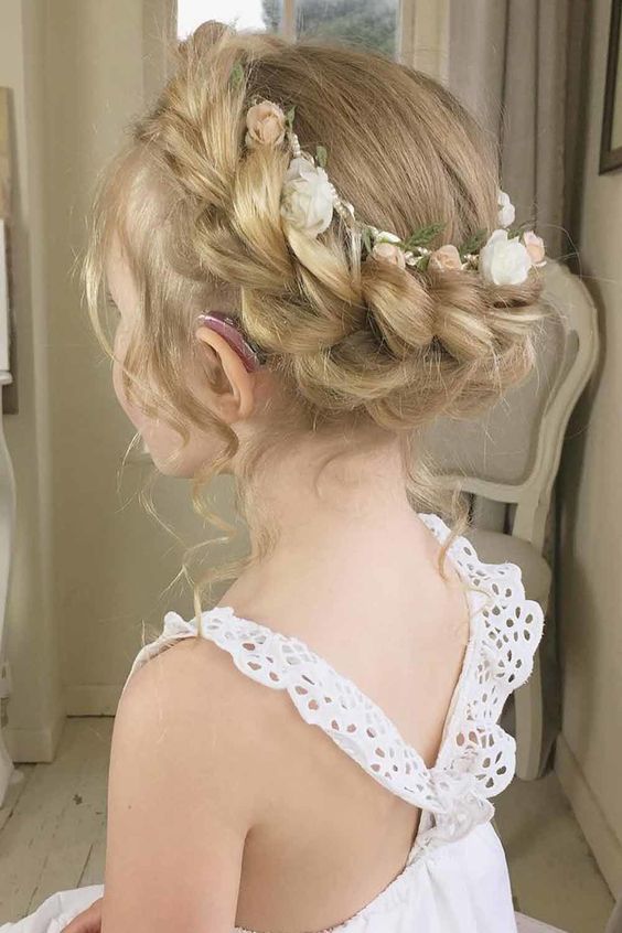 a braided halo with a bit of flowers and waves down to frame the face is a very cool idea for a little flower girl