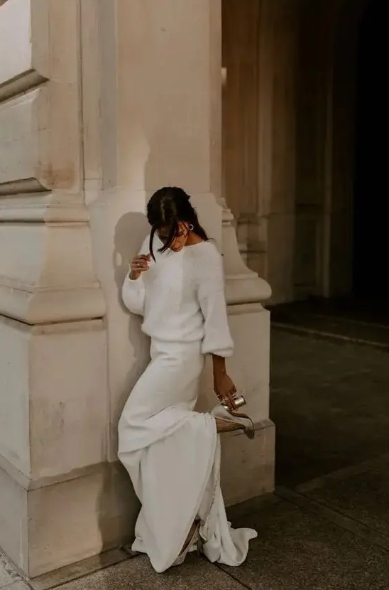 a casual look with a white fuzzy sweater and a maxi skirt wiht a train plus silver shoes is all cool