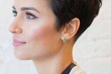 a dark brunette pixie haircut with a lot of volume is a stylish idea if you like short haircuts