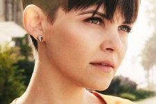 a dark brunette pixie haircut with straight hair and long fringe is a stylish idea to rock, it looks cool