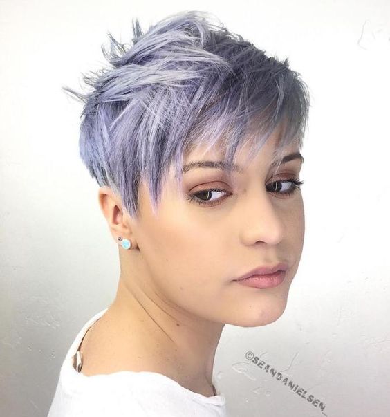 a layered blue to lilac pixie haircut with texture and some volume is a chic and stylish solution