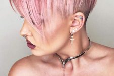 a long layered pink pixie with an undercut and long bangs is a cool and flattering idea, it looks bold and choppy