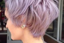 a long lilac shaggy pixie haircut with a lot of volume is a delicate solution with a girlish touch of color