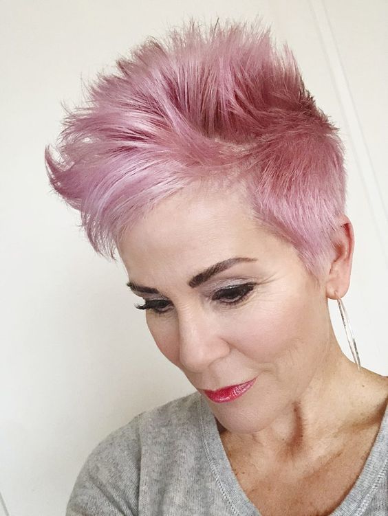 a long pink pixie styled up, with a lot of volume and texture is a super cool and bold idea to try