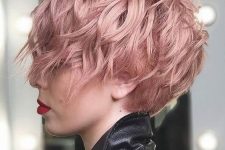 a long wavy pink pixie with long bangs  and volume is a lovely and cool idea for a soft look, waves and the color will flatter