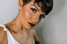 a lovely black pixie haircut with side bangs and a lot of volume is a cool and sexy solution, it accents the eyes