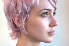 a lovely shaggy lilac to pink long layered pixie with side bangs is an eye-catching idea with a bit of sot color