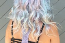 a medium-length mermaid hairstyle with light blue, green and liac and messy waves will turn you into a mermaid at once