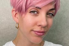a messy asymmetrical long pixie in pink is a gorgeous idea if you want some drama, and this color will catch an eye