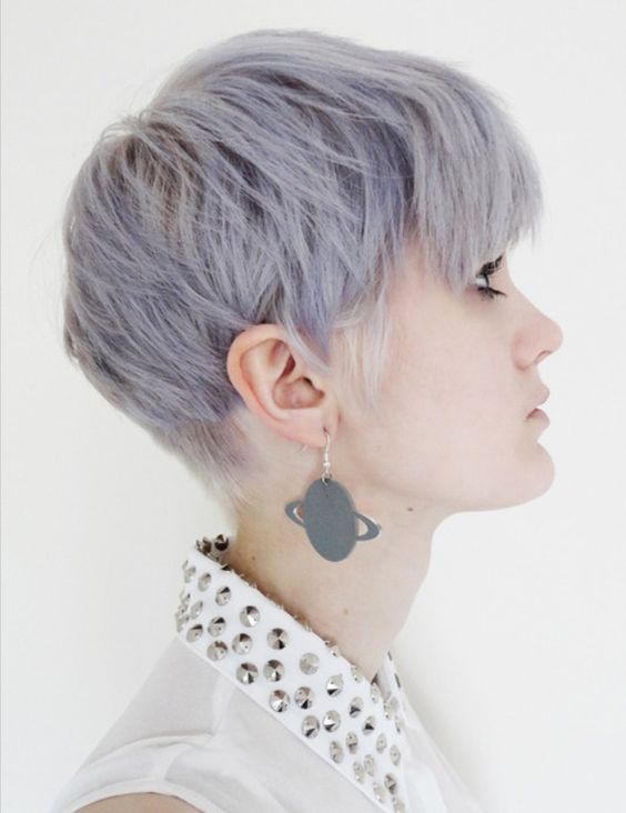 a pale lilac long pixie with side bangs and textured hair plus volume is a chic and stylish solution