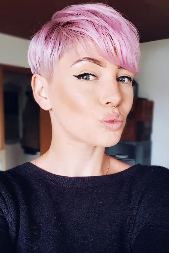 a pastel pink long pixie with long side bangs is always a good idea, its color and length are awesome