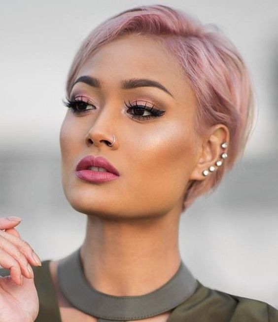 a pastel pink long pixie with side parting and a bit of volume is a chic and girlish idea, it looks delicate and charming