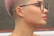 a pastel pixie haircut with an undercut and baby bangs is a very edgy and very bold idea