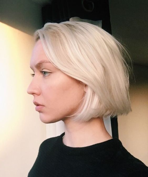 a platinum blonde chin-length bob with a bit of volume is a chic and eye-catching idea to rock