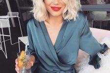 a pretty platinum blonde long wavy bob with a lot of volume is a chic and catchy idea that you can try any time