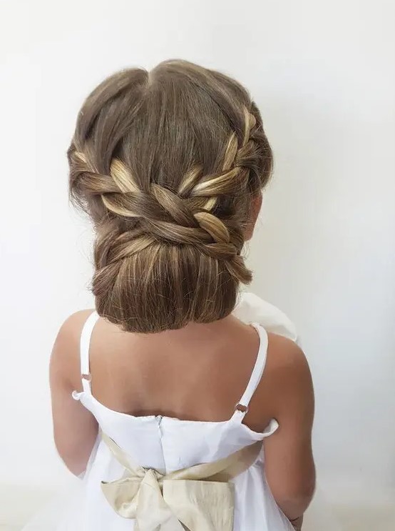 a refined low bun with braids is a beautiful and sophisticated solution for a more formal wedding, and for long hair