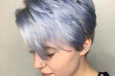 a silver and pastel blue long pixie, with side bangs and volume is a pretty solution if you love cold shades