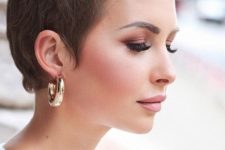 a soft and delicate mouse brown short pixie cut is a lovely idea that looks subtle thanks to the shade