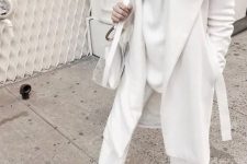 a white sweater, white pants, a coat, mules and a semi sheer bag for a lovely fall or winter look