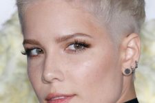 an ash blonde short pixie cut with raised up locks is a very cool and bold idea, and Halsey knows how to rock it