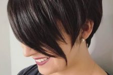 an asymmetrical pixie cut with long bangs is flattering for square faces